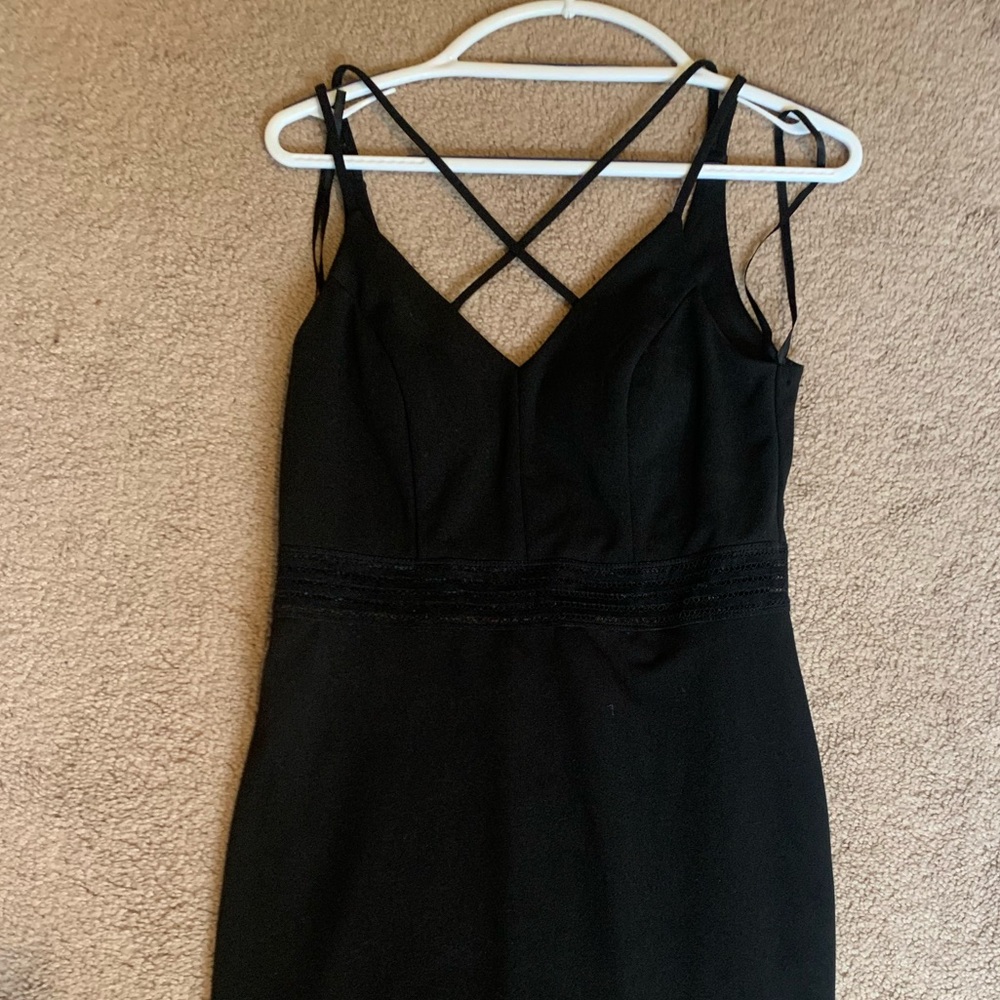 Tight strappy black dress
